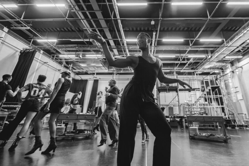 Johannes Radebe with the Full Company. credit Matt Crockett