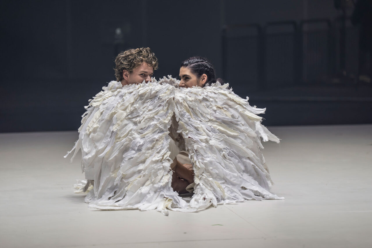 Matthew McKinney and Mariam Wallentin as Boy Angel and Girl Angel in ENO's production of Angel's Bone at Aviva Studios, Manchester. 