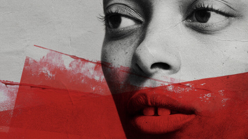 A close-up of a woman's face in black and white with a serious expression, overlaid with bold red brushstrokes across her lips and lower face.
